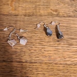 Two sets of dangle earrings